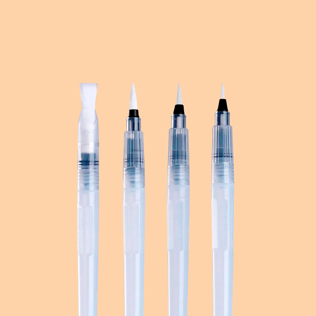Tobio's water brush set showing four refillable brushes with clear water-filled handles