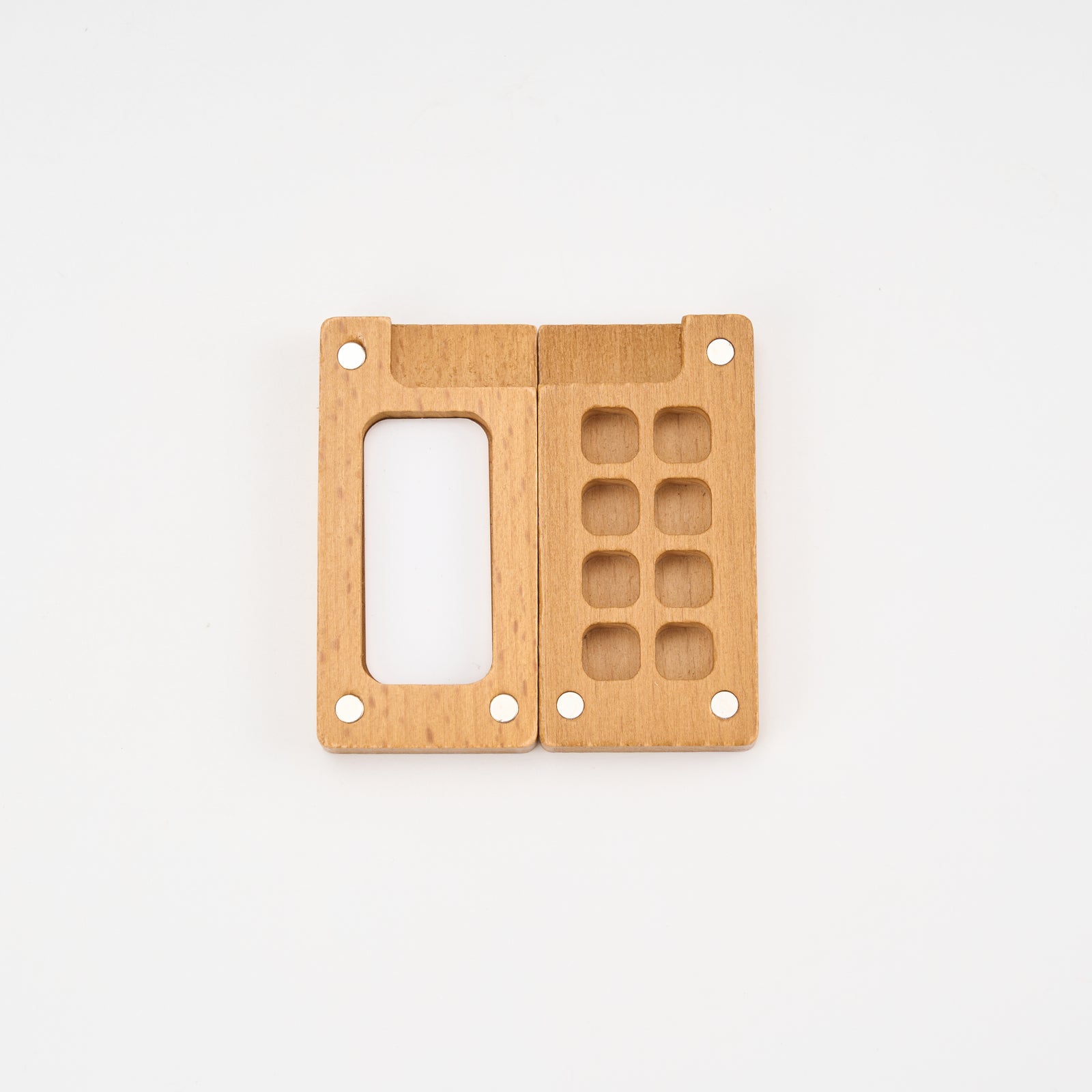 Tobio's wooden watercolor palette with a white mixing well and eight paint wells