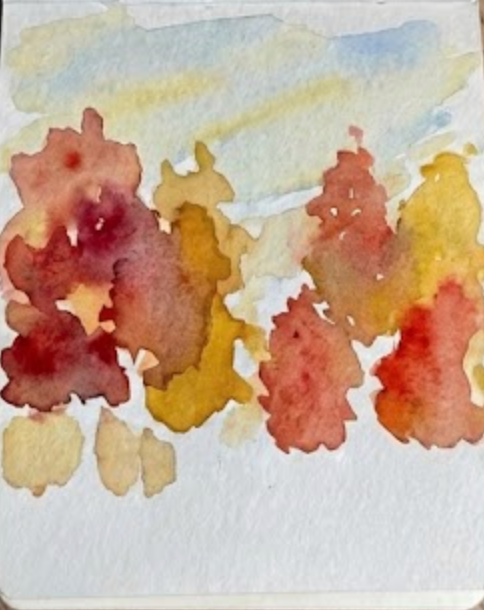Layering deeper reds, burnt oranges, and ochre to create depth and form in the tree foliage of the autumn watercolor painting.