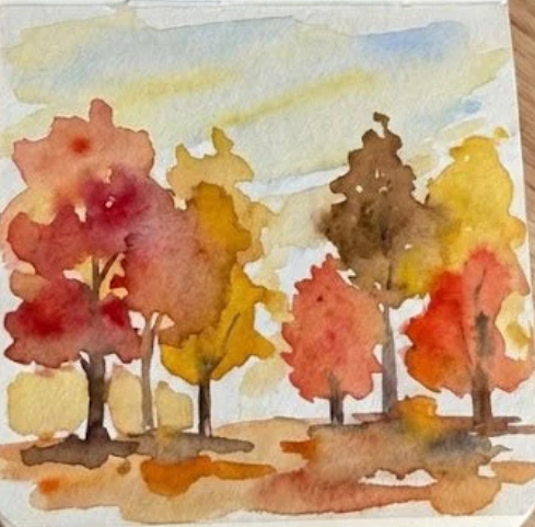 The final completed autumn watercolor painting, showing loose trees with dark trunks and rich fall colors on a simple ground.