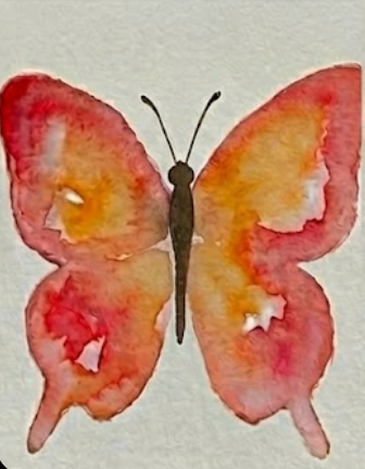Painting the dark brown body and antennae onto the loose butterfly watercolor painting.