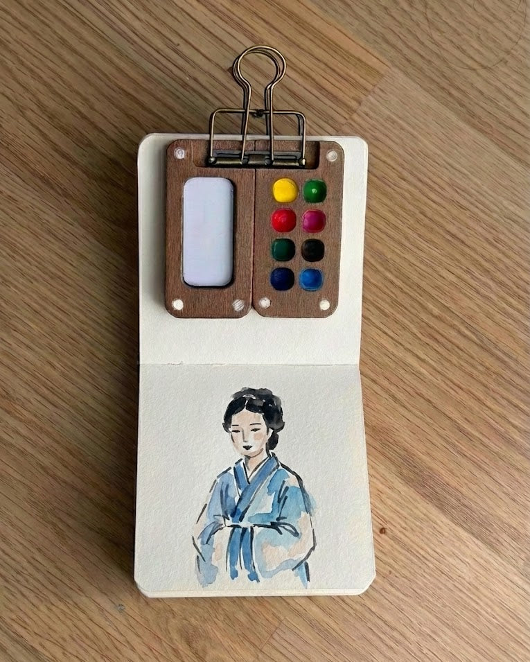 Tobio’s Kits Chinese style watercolor painting, painted in a small watercolor sketchbook with simple details.