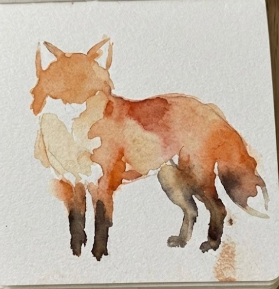 Step 3 of the watercolor fox tutorial, dropping dark brown pigment into the legs and ears to build contrast.
