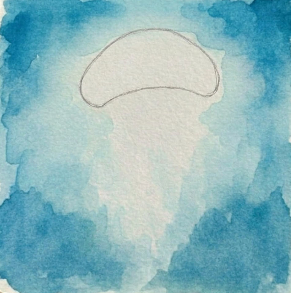 A jellyfish watercolor painting in progress, featuring a vibrant, splashy background wash of Cerulean Blue and Ultramarine pigments surrounding a clean white bell shape.