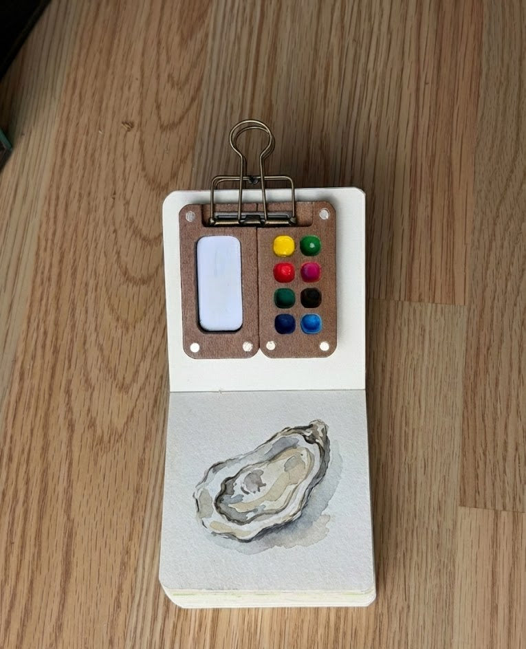 oyster watercolor painting tutorial on a tobio's kits sketch book