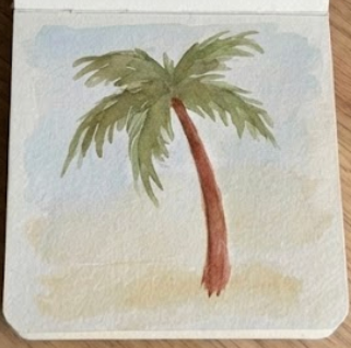 Painting expressive green fronds onto the trunk during a simple palm tree watercolor painting tutorial.