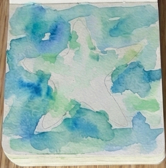 A wet-on-wet watercolor background using loose washes of cerulean blue and sap green painted around the negative space of a starfish shape.