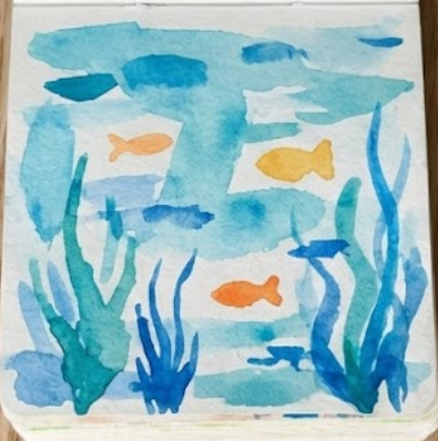 Third step of an underwater watercolor painting, featuring simple orange and yellow fish shapes.