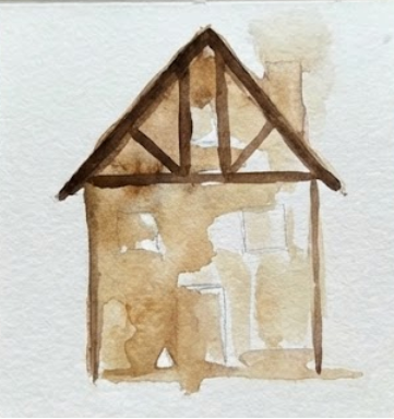Watercolor painting of a house with a triangular roof on a white background