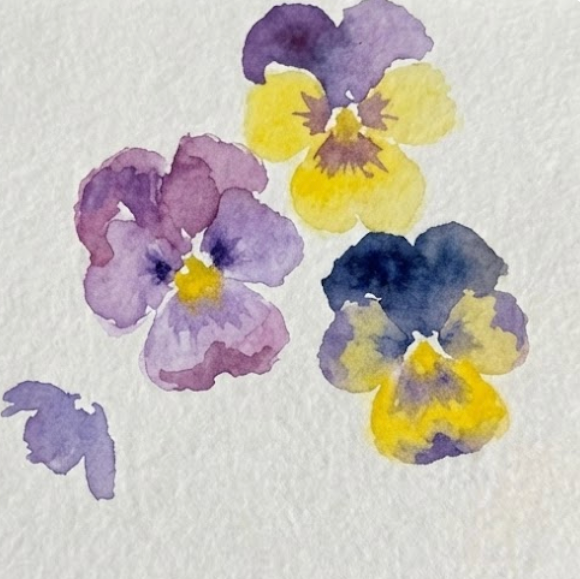 Step 2 of watercolor pansy painting showing soft violet and yellow petals painted wet-on-wet around the centers.
