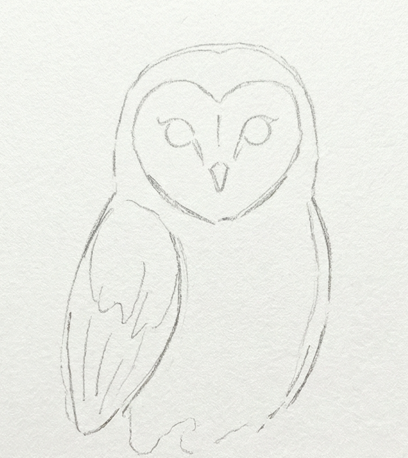 A pencil sketch on textured paper showing the simple shape outlines of an owl's body, head, heart-shaped face, eyes, and beak, representing the initial step for a beginner owl watercolor painting.